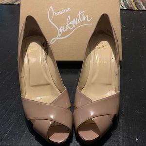 Christin Louboutin Shelley Patent Criss-cross Peep-Toe Pump. Nude.